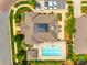Aerial view of community clubhouse, swimming pool, parking lot and manicured landscaping at 1313 Haywood Park Rd, Marvin, NC 28173