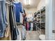This walk-in closet provides ample storage space with shelves and rods to keep your wardrobe organized at 1313 Haywood Park Rd, Marvin, NC 28173
