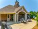 Clubhouse featuring an outdoor patio with comfortable seating and shaded areas at 1313 Haywood Park Rd, Marvin, NC 28173