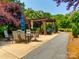 Inviting community patio area features a pergola, comfortable seating, and a peaceful walkway at 1313 Haywood Park Rd, Marvin, NC 28173