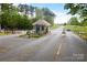Gated community entrance with a guardhouse for added security and peace of mind at 141 Badin Lake Cir, New London, NC 28127