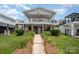 Charming multi-level house with a lush green lawn at 141 Badin Lake Cir, New London, NC 28127