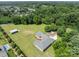 Expansive property featuring a modern home, large yard, swimming pool, and detached garage at 15020 Ranson Rd, Huntersville, NC 28078