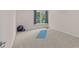 Neutral bedroom featuring carpeted floors, a large window, and ample natural light at 15020 Ranson Rd, Huntersville, NC 28078
