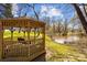 Enjoy the gazebo on the pond, perfect for relaxing and enjoying the beautiful nature views at 15020 Ranson Rd, Huntersville, NC 28078