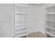 Walk-in closet features ample shelving and storage spaces, great for organization at 15020 Ranson Rd, Huntersville, NC 28078