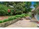 Charming patio with room for seating in a lush backyard at 151 Cynthia St, Statesville, NC 28677