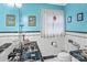 Charming blue and white bathroom with decorative sink, toilet, and window at 151 Cynthia St, Statesville, NC 28677