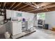 Basement laundry room featuring a washer, dryer and storage at 151 Cynthia St, Statesville, NC 28677