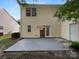 Back exterior with patio and sliding glass door at 1573 Maypine Commons Way, Rock Hill, SC 29732