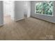 Bright bedroom featuring neutral carpet, closet, and a bright window at 1573 Maypine Commons Way, Rock Hill, SC 29732