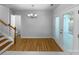 Bright dining room with hardwood floors and double doors leading to the outside at 1573 Maypine Commons Way, Rock Hill, SC 29732