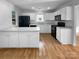 Bright kitchen with white cabinetry and stainless steel appliances at 1573 Maypine Commons Way, Rock Hill, SC 29732