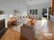 Bright living room features vaulted ceilings, fireplace, and neutral decor at 1573 Maypine Commons Way, Rock Hill, SC 29732