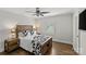 Comfortable bedroom with hardwood floors and natural light at 1619 Providence Rd, Charlotte, NC 28207