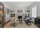 Chic living room with a fireplace, elegant seating, and decorative shelving at 1619 Providence Rd, Charlotte, NC 28207