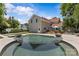 Beautiful in-ground pool and spa with an outdoor dining area and a well manicured yard at 1619 Providence Rd, Charlotte, NC 28207