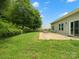 The backyard includes a patio with a fire pit and a well-maintained lawn at 1660 Beleek Ridge Ln, Lake Wylie, SC 29710