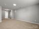 Finished basement offers versatile space with carpeted flooring at 1660 Beleek Ridge Ln, Lake Wylie, SC 29710