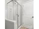 Modern bathroom featuring a glass-enclosed shower with tiled floors at 1660 Beleek Ridge Ln, Lake Wylie, SC 29710