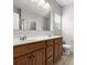 Bathroom featuring double sink vanity with modern fixtures and a large mirror at 1660 Beleek Ridge Ln, Lake Wylie, SC 29710