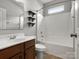 Functional bathroom with a tub, floating shelves, and vanity sink at 1660 Beleek Ridge Ln, Lake Wylie, SC 29710