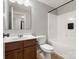 Cozy bathroom with tub, shower, vanity, and a dark wood cabinet at 1660 Beleek Ridge Ln, Lake Wylie, SC 29710