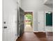 Welcoming foyer with hardwood floors and a view into the living space with great natural light at 1660 Beleek Ridge Ln, Lake Wylie, SC 29710