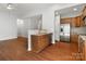 Open kitchen featuring granite counters and stainless steel appliances at 1660 Beleek Ridge Ln, Lake Wylie, SC 29710