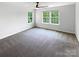 Bright bedroom with soft carpet and two windows at 1680 Trentwood Dr, Fort Mill, SC 29715