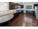 Modern kitchen with dark cabinetry, stainless steel appliances, and granite countertops at 1680 Trentwood Dr, Fort Mill, SC 29715