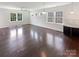 Spacious living room with hardwood floors and an abundance of natural light at 1680 Trentwood Dr, Fort Mill, SC 29715