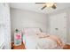 Charming bedroom with hardwood floors, ceiling fan and closet at 175 Turnberry Ln, Mooresville, NC 28117
