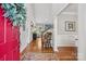 Bright entryway with hardwood floors and views into the living spaces at 175 Turnberry Ln, Mooresville, NC 28117