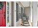 Inviting front porch with rocking chairs and classic home details at 175 Turnberry Ln, Mooresville, NC 28117
