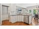 Kitchen area showcasing black marble countertop and stainless steel appliances at 175 Turnberry Ln, Mooresville, NC 28117