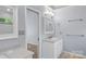 Modern bathroom featuring updated fixtures, vanity, lighting, and a separate water closet at 176 Sharon Valley Dr, Hickory, NC 28601