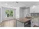 Bright kitchen area with granite countertops, modern appliances, and lots of storage at 176 Sharon Valley Dr, Hickory, NC 28601