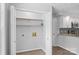 Spacious laundry area adjacent to the updated kitchen with shelving for storage at 176 Sharon Valley Dr, Hickory, NC 28601