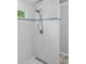 Beautifully tiled shower with modern fixtures and a mosaic tile accent for a spa-like bathroom experience at 176 Sharon Valley Dr, Hickory, NC 28601