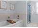 Bright bathroom featuring a soaking tub, shower with tiled walls, and natural light at 1826 Hall Ave, Charlotte, NC 28205
