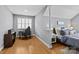 Bedroom featuring a work area and bed with light gray walls and hardwood flooring at 1826 Hall Ave, Charlotte, NC 28205
