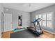 Versatile exercise room with a treadmill, mirror, and workout accessories for a healthy lifestyle at 1826 Hall Ave, Charlotte, NC 28205