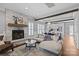 Open-concept living area with stone fireplace and seamless flow to the kitchen; great space for entertaining at 1826 Hall Ave, Charlotte, NC 28205