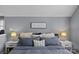 Inviting main bedroom featuring a comfortable bed with decorative pillows and matching bedside lamps at 1826 Hall Ave, Charlotte, NC 28205