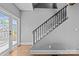 Elegant staircase with modern railings leading to the upper level of the home at 1826 Hall Ave, Charlotte, NC 28205