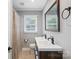 Bathroom with double sink vanity and natural light at 2131 Lee St, Gastonia, NC 28054