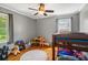 bedroom with hardwood floors, ceiling fan, and bunk beds at 2131 Lee St, Gastonia, NC 28054