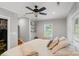 Bright bedroom with neutral walls, a ceiling fan, and a large window at 2131 Lee St, Gastonia, NC 28054