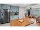 Stylish eat-in kitchen featuring granite counters, stainless appliances, and convenient storage at 2131 Lee St, Gastonia, NC 28054